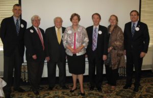 Past Presidents Bill Holm, Howard Matson, Charlie Blaisdell, Peter Mosse, Esther Dyer and Jeff Kelly welcoming newly elected International President Ellen Parke. 